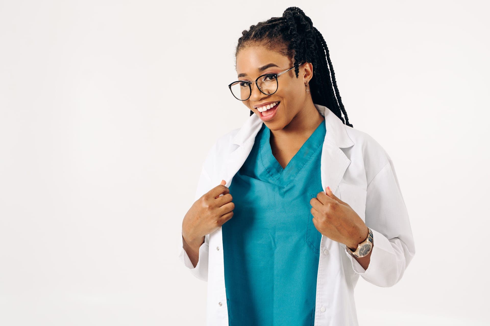 A teal v-neck scrub top with chest pockets